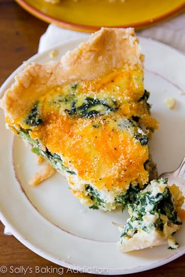 This super cheesy spinach quiche is baked in my favorite homemade pie crust. Impress all your brunch guests with this recipe!
