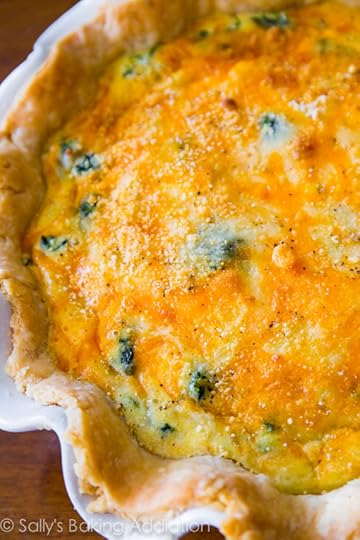 This super cheesy spinach quiche is baked in my favorite homemade pie crust. Impress all your brunch guests with this recipe!
