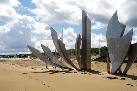 This year marks the 70th anniversary of D-Day, commemorated by this sculpture (Les Braves, by Anilore Banon) on Omaha Beach, honoring the courageous soldiers who landed here.