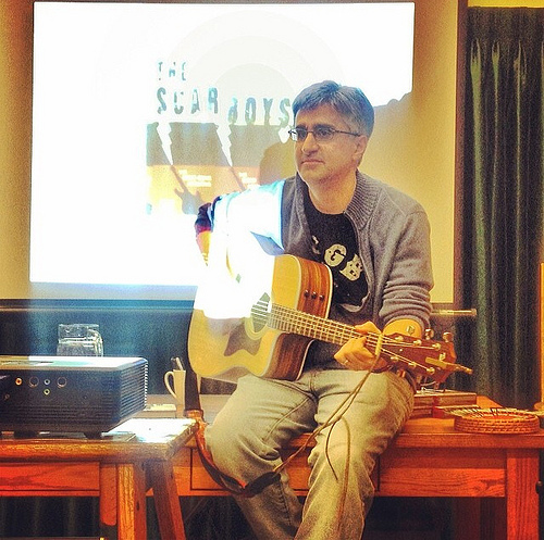 Playing guitar