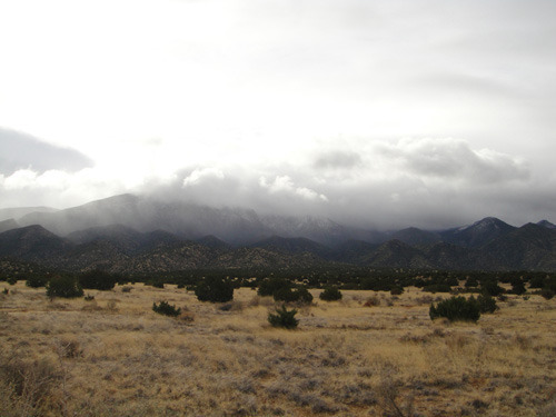 Ooh. Look. Clouds caught up on the Sandias. Cannot bode well for us.