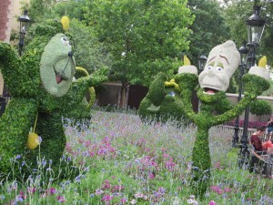 Cogsworth and Lumiere in the France Pavilion during the Epcot Flower and Garden Festival