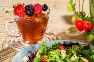 Berry tea cocktail and field green with Plant City strawberries ©Disney