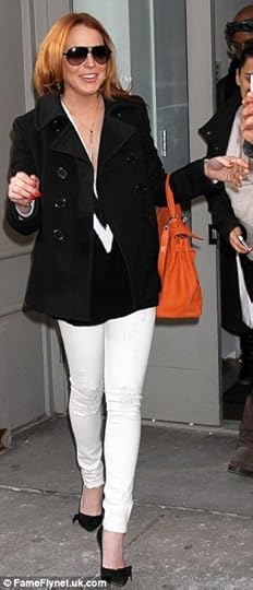 Lively: The redhead's outfit got a boost thanks to that orange bag