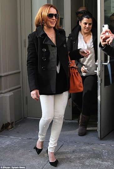 Confident: Lindsay's come under criticism for doing a reality TV show so soon after her rehab release but no doubt that Birkin bag provided a boost of confidence