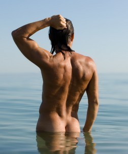 Edge Grayson bathing in river.