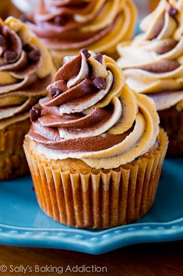 The ultimate trio of your favorite flavors! Super-moist banana chocolate chip cupcakes topped with milk chocolate and peanut butter swirled frosting. 