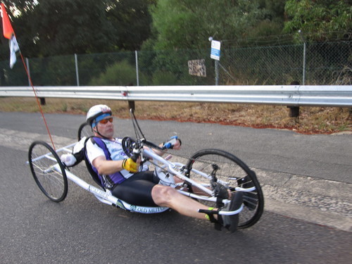 Recumbent bike riders pedal with their hands and arms.