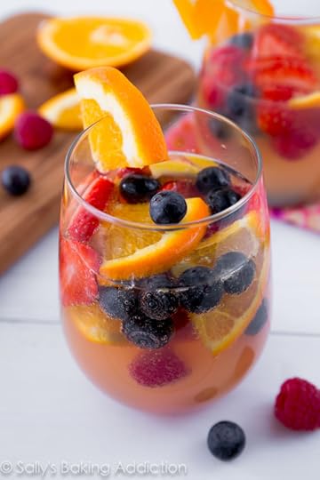 Sparkling Fruit Sangria filled with champagne, berries, oranges, and more. There's always a reason for celebrating with sangria!