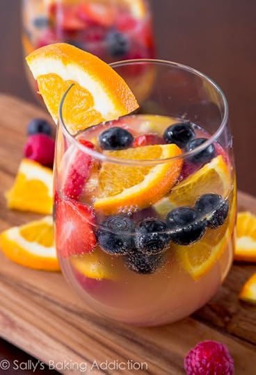 A crowd-pleasing bubbly, fruity white sangria that is perfect for any occasion! sallysbakingaddiction.com