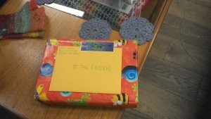 Shauli found the gift that Terie hid at a yarn shop in Manchester.
