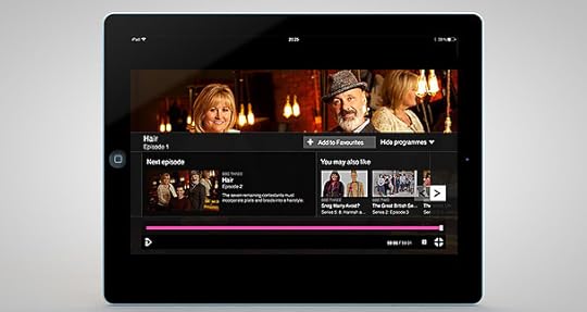 The More Programmes panel opens automatically at the end of playback