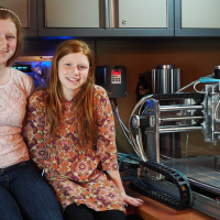Camille and Genevieve Beatty with their CNC mill.