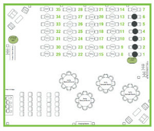 The uPublishU AUTHOR HUB on the floor of BookExpo America's trade show features a presentation area, networking tables, comfortable sofas and a receptionist.