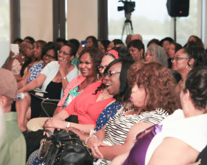 Audience enjoying a wisecrack by Ms. McMillan