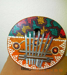 ...AND TRY THEIR HAND AT THE MBIRA, A TRADITIONAL AFRICAN INSTRUMENT THAT DARKO PLAYS