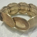 gold medallion bracelet