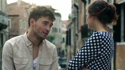 stock-footage-boy-and-girl-talking-in-venice
