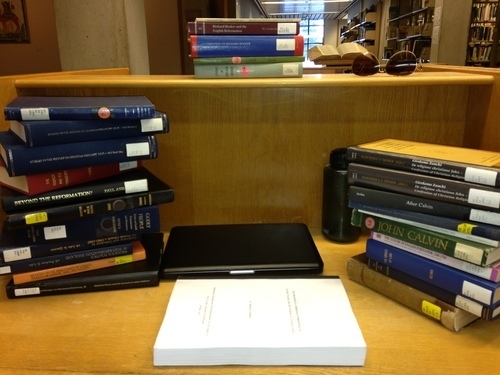 Yup, that's the big fat dissertation in the foreground—don't worry, they make you print it single-sided and 1.5-spaced, and on really thick paper, so the book shouldn't be nearly as chunky as you're fearing.