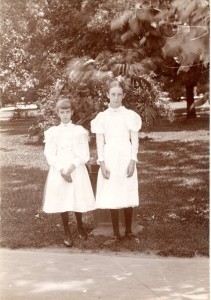 Elsie & her older sister Hylinda before they moved from Virginia to California. Appears they were at the cemetery