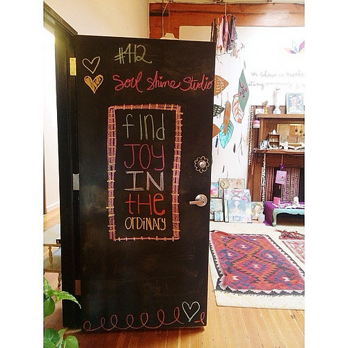 Came to work today at #soulshinestudio and was surprised by our new door art. I wonder who did it @rarebyrdamy ???? #love #thankyou