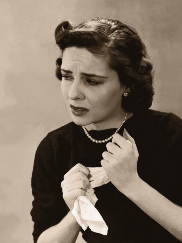 anxious-nervous-woman-wringing-handkerchief-in-her-hands