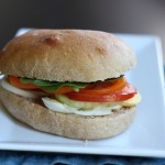 Egg Plus Salad Sandwiches - Go beyond the egg salad sandwich with this egg + salad sandwich. Hard cooked eggs, vinaigrette, and abundant veggies make a delicious and economical meal for Sandwich Night.