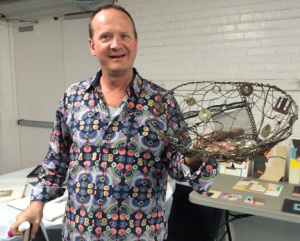 Adix shows a basket made of found pieces of wire and metal.