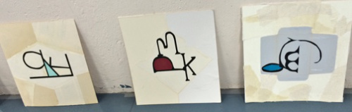 From left to right, the letters are LKP, PKM, and QCM.