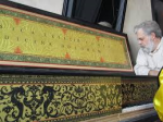 Jenison examines the harpsichord he built as part of the recreation of the room for his experiment with 