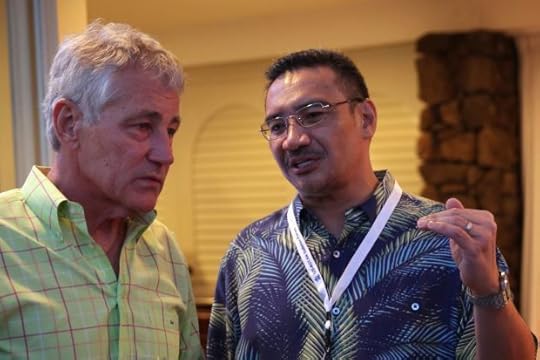 US Secretary of Defense Chuck Hagel (left) listens to Hishammuddin (right) during a welcome reception for Southeast Asian defence ministers April 1, 2014 in Honolulu, Hawaii.