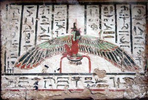 Green Isis, looking like Ma'at, but you can identify Her by the throne on Her head. She is seated on the glyph for 