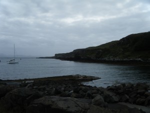 small concrete jetty and grey sea