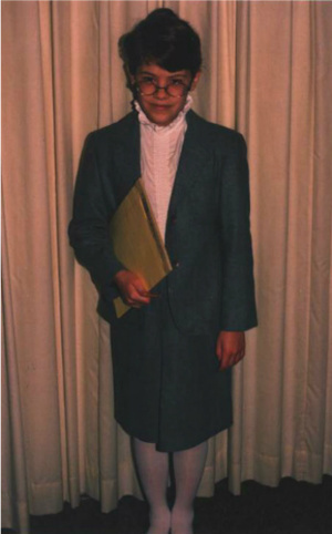 I dressed up as an author for career day in third grade. Had I known the actual "uniform" of the working writer, I would have just worn my pajamas. 