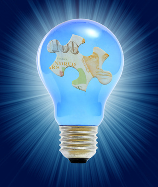 puzzle piece in lightbulb