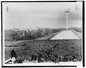 Marian Anderson, (lower left), standing on the steps of the Lincoln Memorial with back to camera, facing the Washington Monument and a crowd of thousands. 1939. Prints and Photographs Division. 