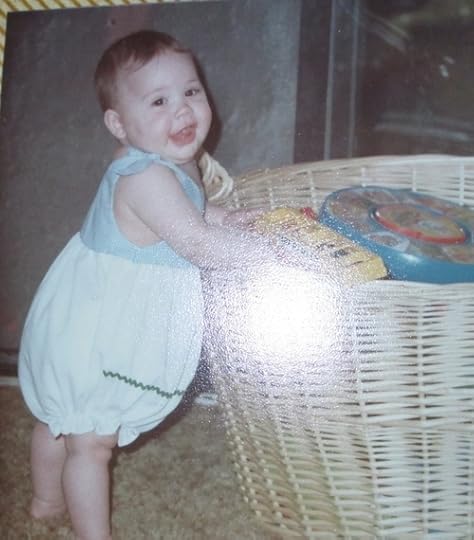 At 8 months, Yoga Baby's Aunt Lexi could stand, holding on. But she needed help to get up there. 