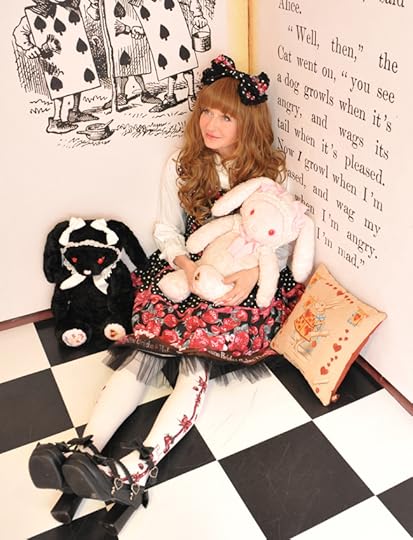 The photographer poses you in dozens of ways on the cute Alice In Wonderland set, and you can order whichever ones you like, in either digital or printed-out form.