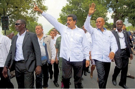 Super-leftist Venezuelan leader Nicolas Maduro cozy up to despotic Right-wing US puppet- president, Michel Martelly