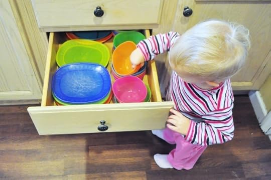 emptying dishwasher