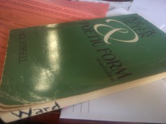 Stasia's college copy of Fussell with her maiden name scrawled on the side.