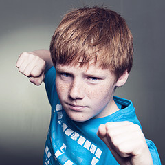 Boy with raised fists