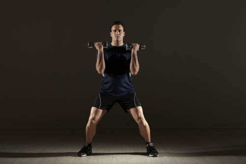 Jumping Jacks with Bicep Curls. Michael Gonzalez-Wallace shows this week 