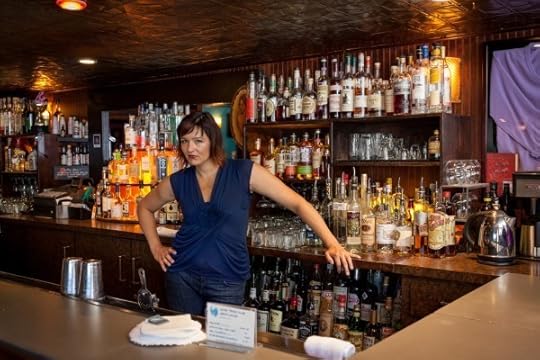 Bartender behind her bar