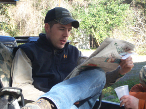 James Guthrie, reading The Oconee Leader. This may be the closest thing to a photo of the two of us together.