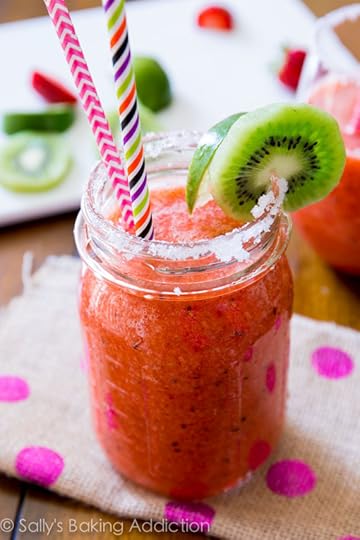 Sweet and tangy Frozen Strawberry Kiwi Margaritas - they're so easy, you'll be making pitcher after pitcher!
