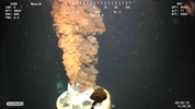 Macondo well gushes oil after Deepwater Horizon oil rig burns and falls