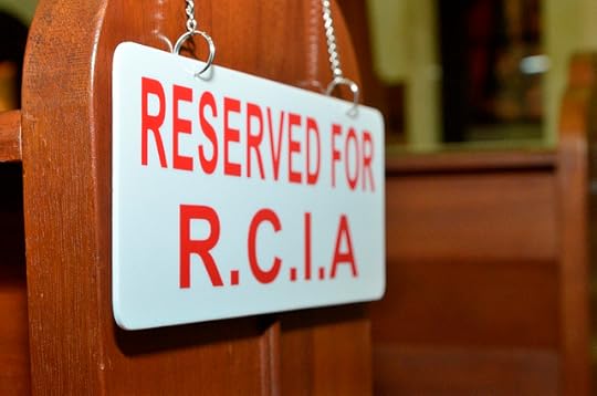 Sign reserving pews for the Catechumens.