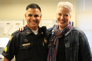 Julie with Patrick Towle right before our police ride along.