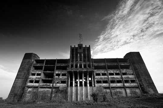 Monrovia, Liberia - 24 February 2012: The abandoned Ministry of Defence building stands empty and ruined, a reminder of the civil war here not so long ago. © MickyWiswedel via iStockphoto.